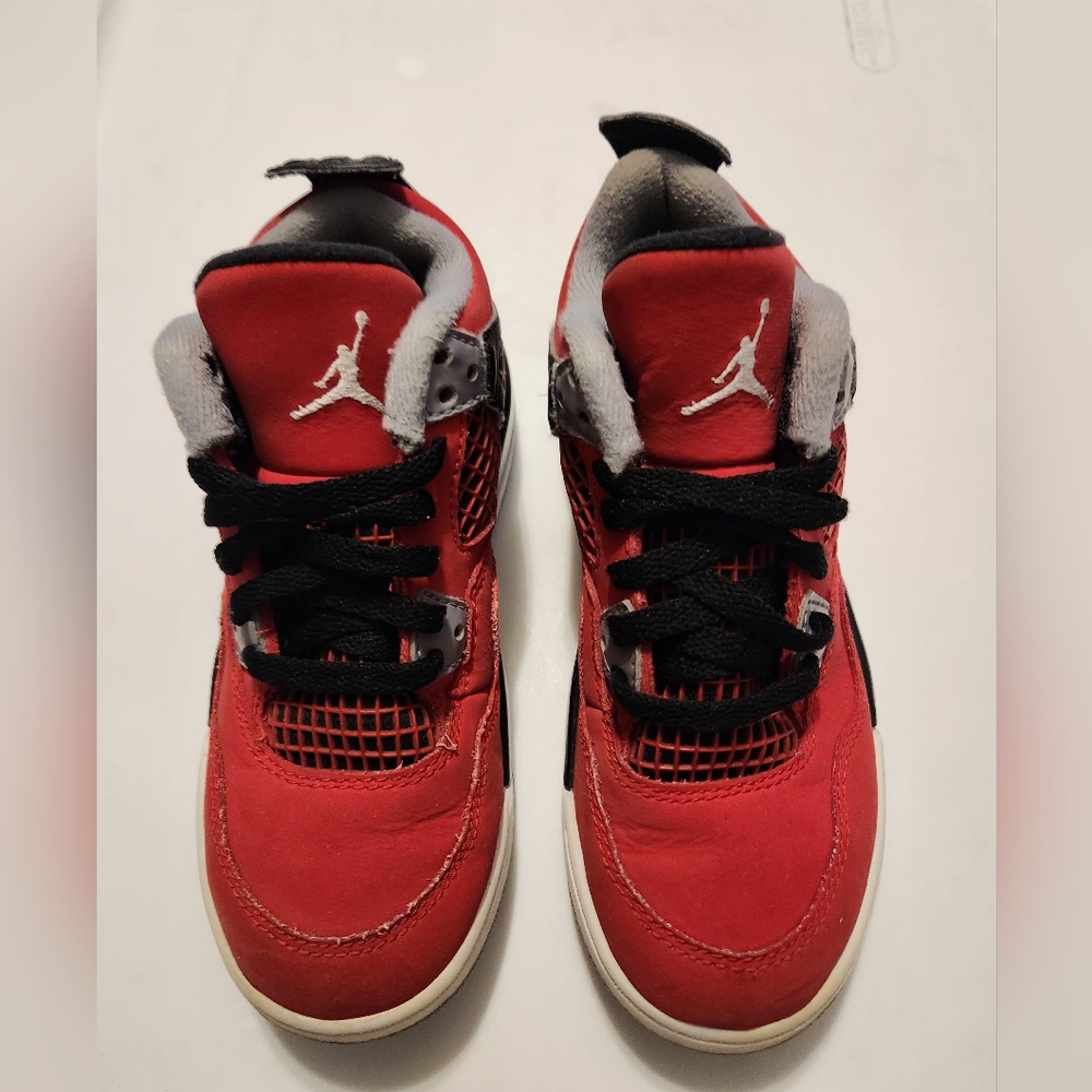 Kids Jordan 4 Retro "Toro Bravo"